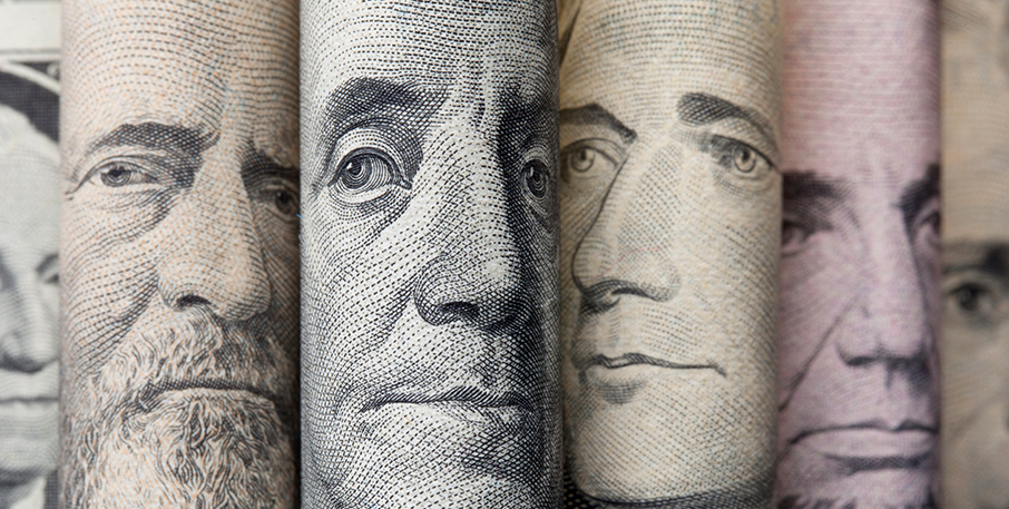 Close-up of portraits from various bank notes